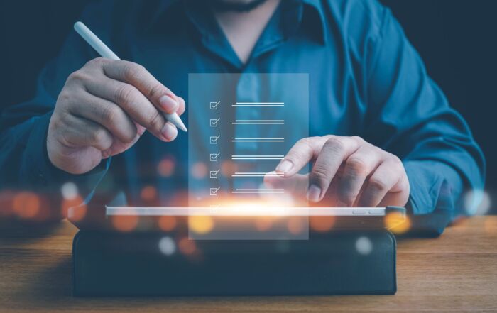 Auditor reviewing a digital checklist | HIPAA compliance for medical offices