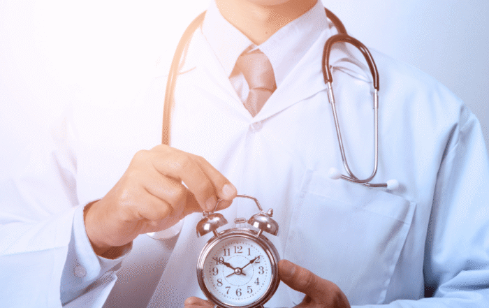 A doctor holding a clock | DOJ's 2026 Unified Enforcement Policy