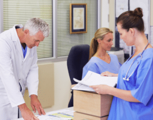 Compliance manager reviewing a monthly OIG exclusion list check for employees and vendors