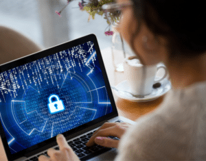 Compliance officer reviewing a HIPAA security checklist for Cybersecurity Awareness Month in healthcare